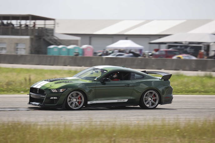 Green Shelby GT500 on track
