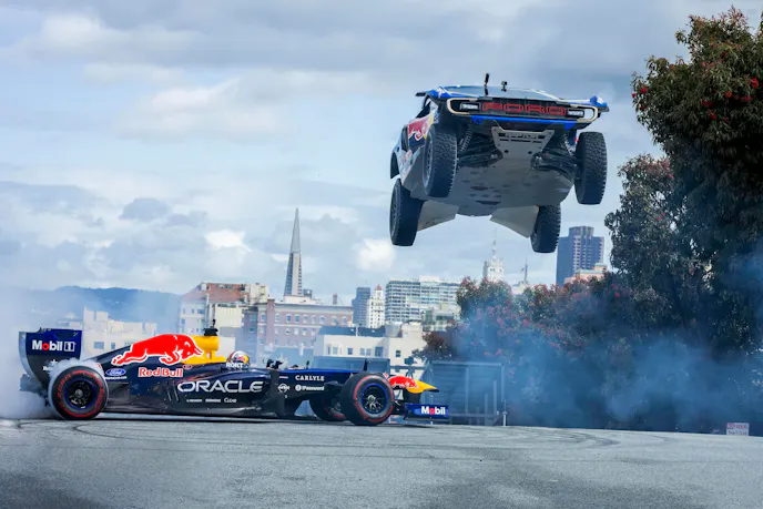 Ford Raptor T1+ Jumps over the Oracle Red Bull Racing RB7 Formula 1 car in San Francisco