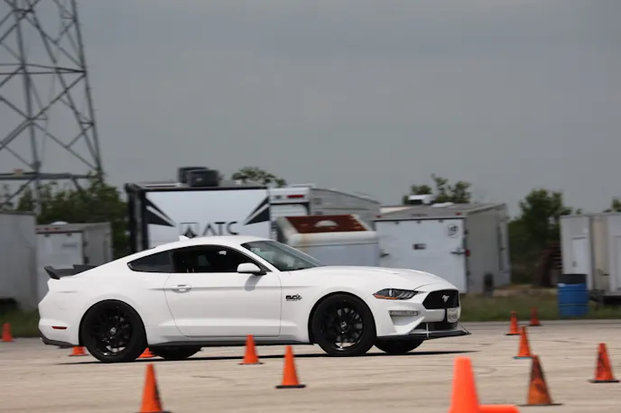 White Mustang in action at Autocross