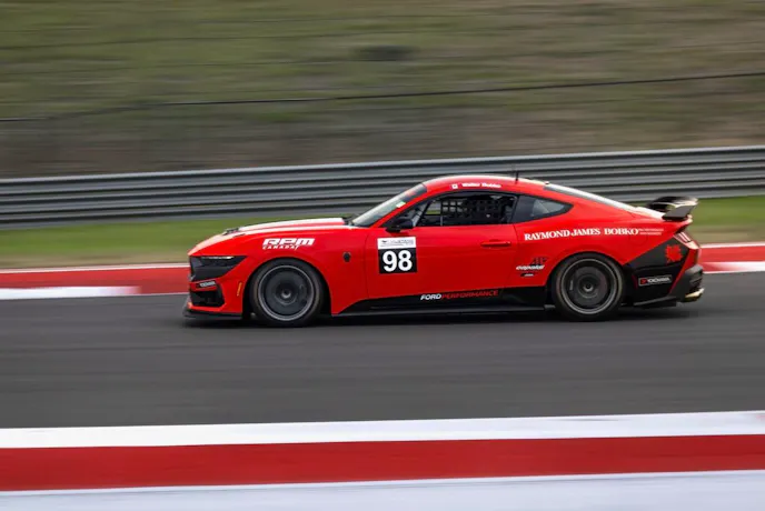 Red Mustang Dark Horse R on track
