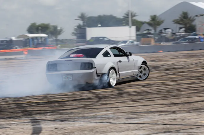 Gray S197 drift mustang in action