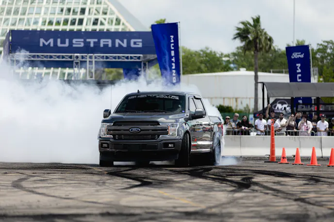 Black f-150 burnout at Mustang Week