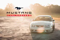 Gray Mustang in the sun with Mustang Unleashed logo