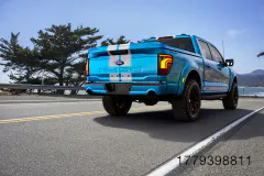Out back, the truck features oversized 3D Shelby lettering, Le Mans-style stripes, a painted tonneau cover, body-color trim pieces, and Championship Edition graphics tied to the Daytona, Sebring, or Le Mans tribute color schemes. (Photo Credit: Shelby American)